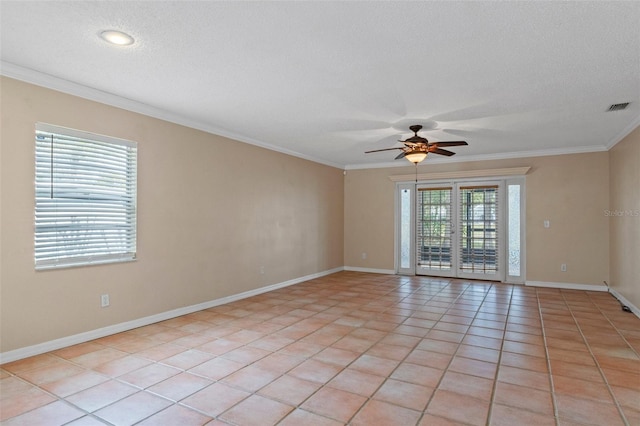 unfurnished room with crown molding, light tile patterned floors, ceiling fan, and a textured ceiling