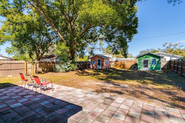 view of patio with a shed