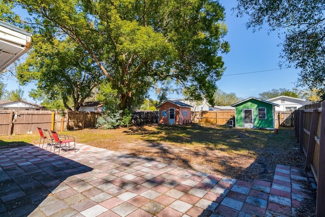 view of patio / terrace with a storage unit