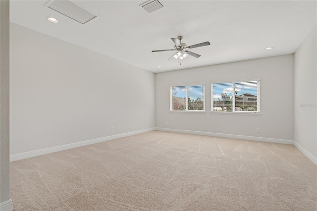 carpeted empty room with ceiling fan