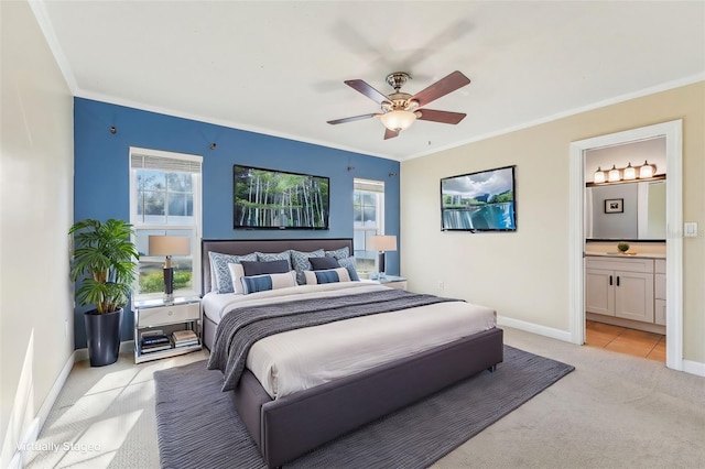 carpeted bedroom with crown molding, ceiling fan, and ensuite bathroom