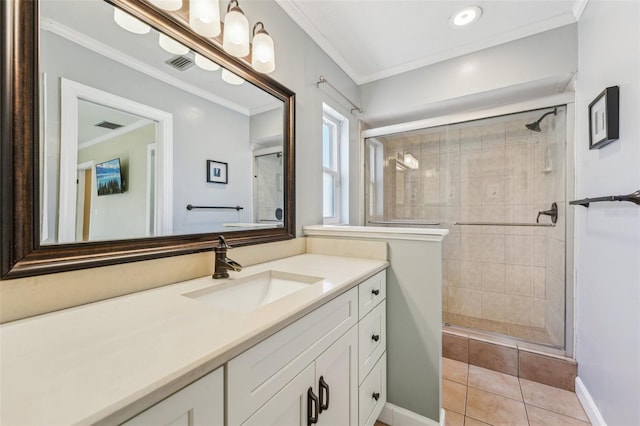 bathroom featuring walk in shower, tile patterned floors, vanity, and crown molding