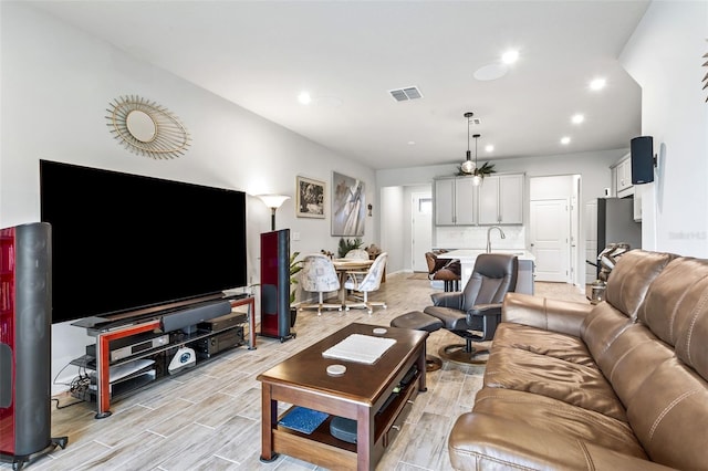 living room featuring ceiling fan