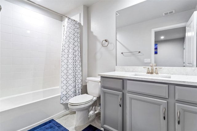 full bathroom with vanity, toilet, and shower / bath combo