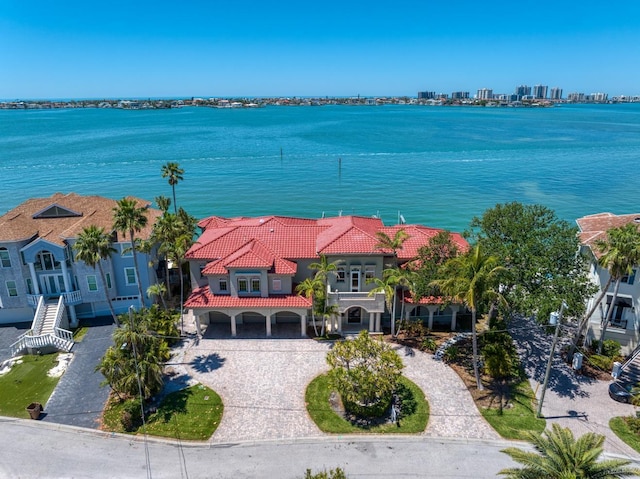 birds eye view of property featuring a water view
