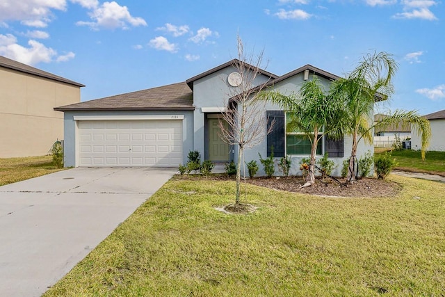 ranch-style house with a garage and a front yard