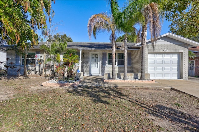 ranch-style house with a garage and a front yard