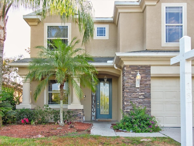 property entrance featuring a garage