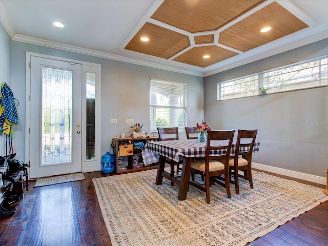 dining area with crown molding, coffered ceiling, dark hardwood / wood-style floors, and wooden ceiling