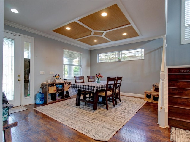 dining space with crown molding, wood ceiling, and dark wood-type flooring