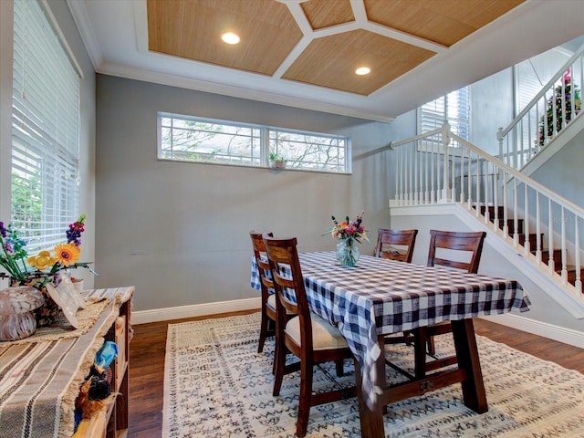 dining room featuring plenty of natural light and wooden ceiling