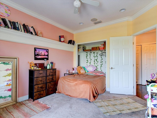 carpeted bedroom with crown molding and ceiling fan