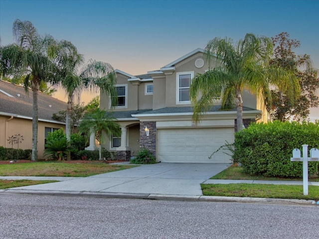 view of front of property with a garage