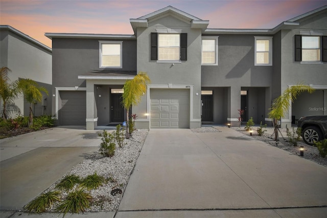 view of front of home with a garage