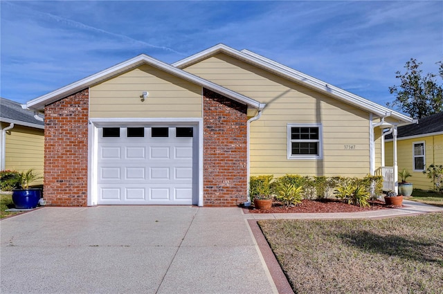 view of front of home with a garage