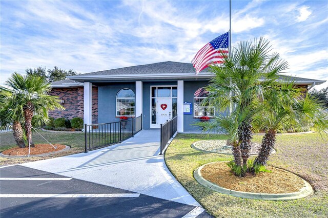 view of front of home featuring covered porch