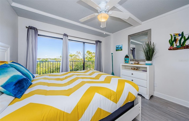 bedroom with crown molding, ceiling fan, hardwood / wood-style floors, a textured ceiling, and access to outside