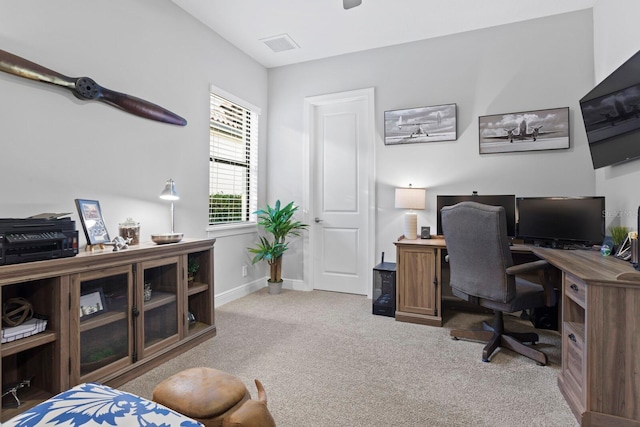 office area featuring light colored carpet