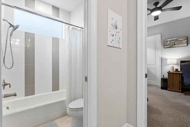 bathroom featuring ceiling fan, toilet, and shower / bath combo