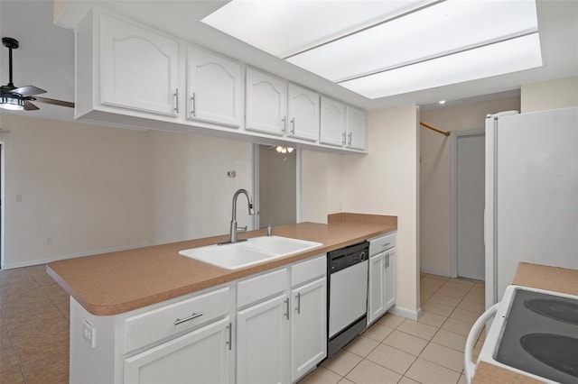 kitchen with sink, white appliances, light tile patterned floors, ceiling fan, and white cabinetry