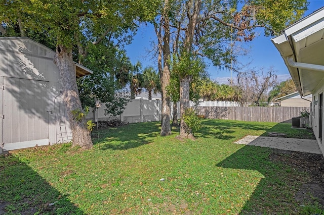 view of yard with central AC