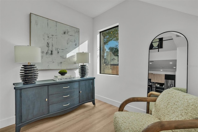 sitting room with light hardwood / wood-style floors