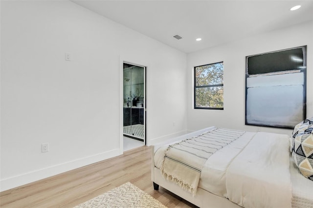 bedroom featuring hardwood / wood-style floors