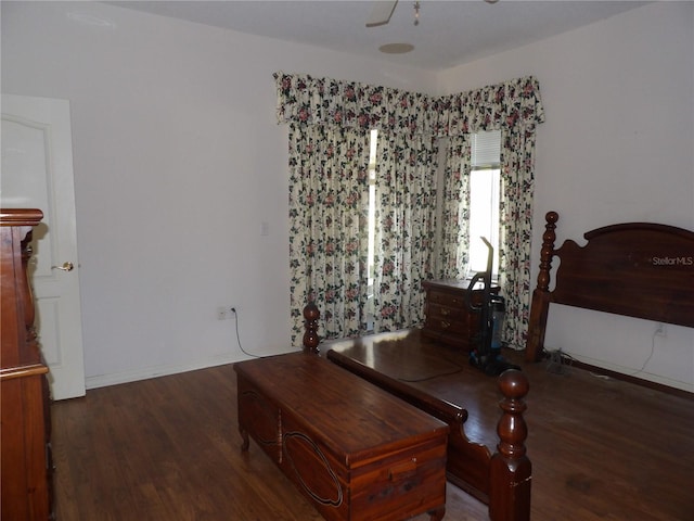 bedroom featuring dark hardwood / wood-style flooring