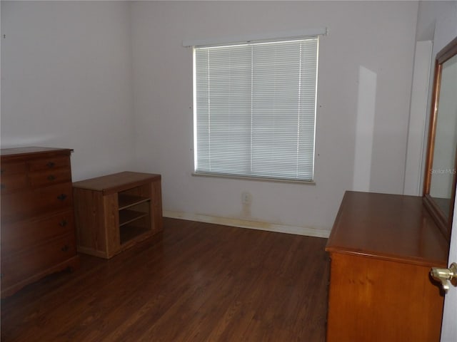 interior space with dark hardwood / wood-style flooring