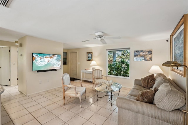 living room with light tile patterned floors and ceiling fan