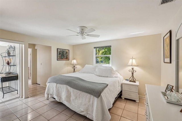 bedroom featuring light tile patterned floors, access to outside, and ceiling fan