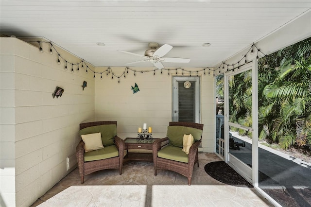 sunroom / solarium with ceiling fan