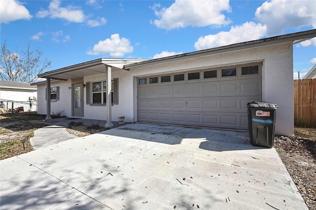 single story home featuring a garage