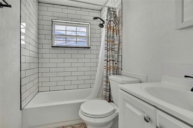 full bathroom featuring shower / bathtub combination with curtain, vanity, and toilet