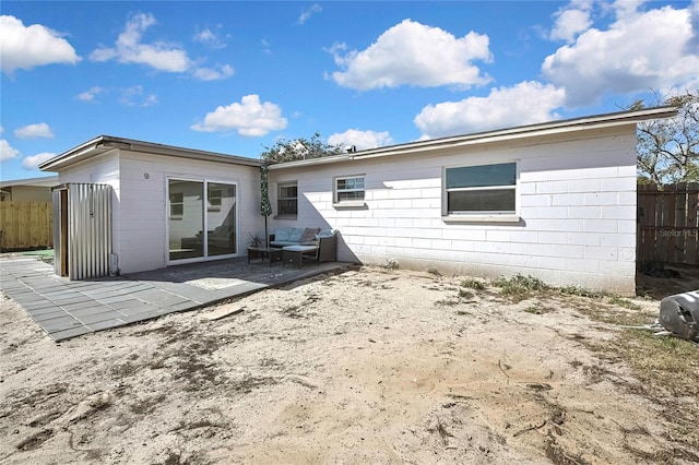 rear view of house with a patio area