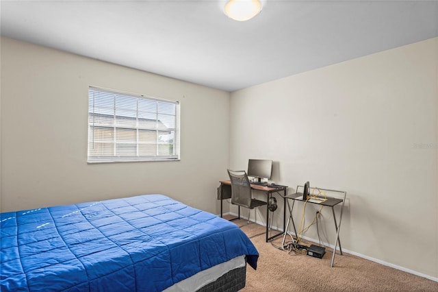 bedroom featuring carpet