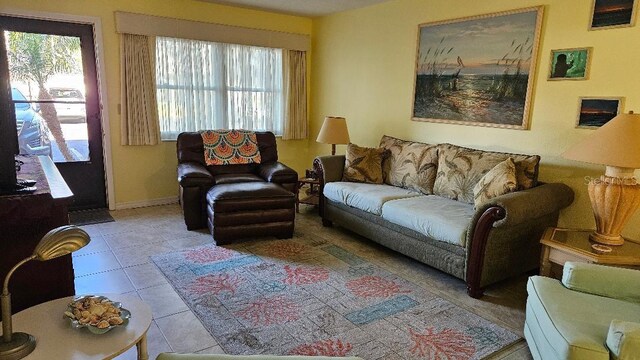 living area featuring tile patterned flooring