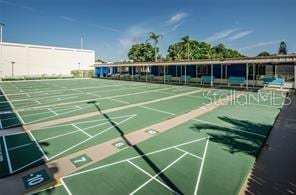 view of home's community with shuffleboard
