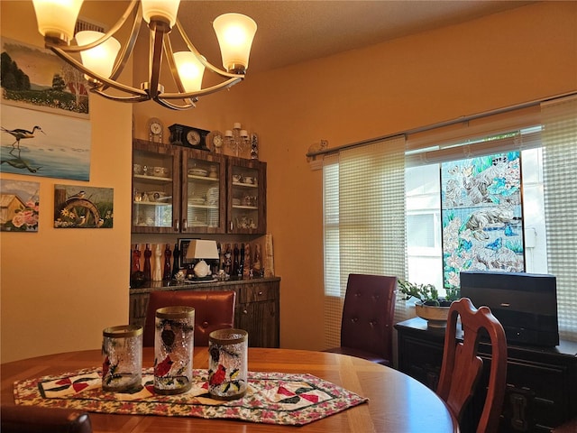 dining room with a chandelier