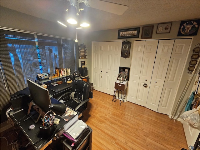 office space with hardwood / wood-style flooring