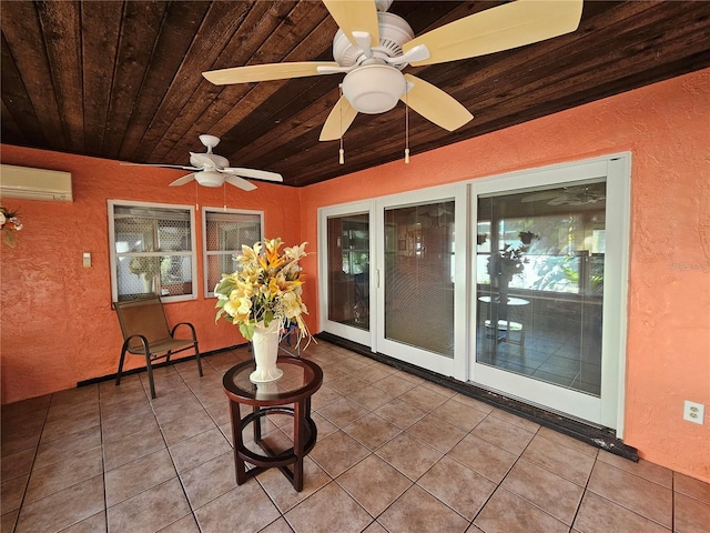 view of patio featuring ceiling fan and a wall mounted air conditioner