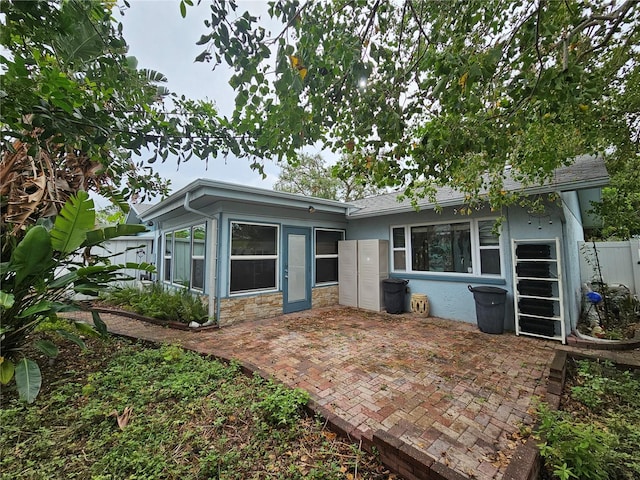 back of house with a patio area