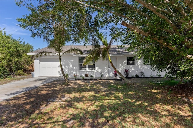 ranch-style home with a garage