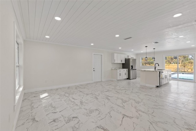 unfurnished living room featuring crown molding, sink, and wooden ceiling