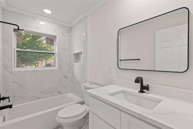 full bathroom featuring crown molding, tiled shower / bath, vanity, and toilet