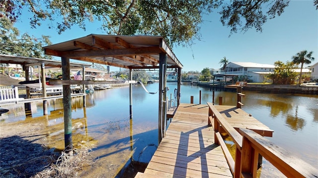 view of dock with a water view