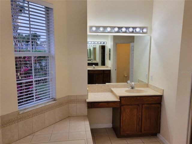 bathroom with vanity and tile patterned flooring