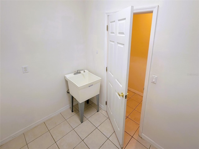 bathroom with tile patterned flooring