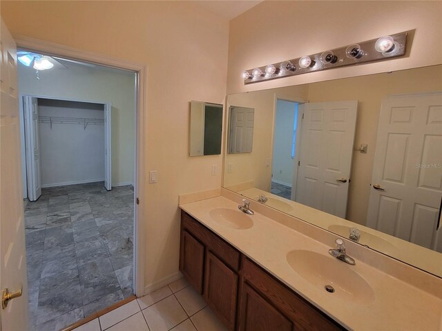 bathroom featuring tile patterned floors and vanity