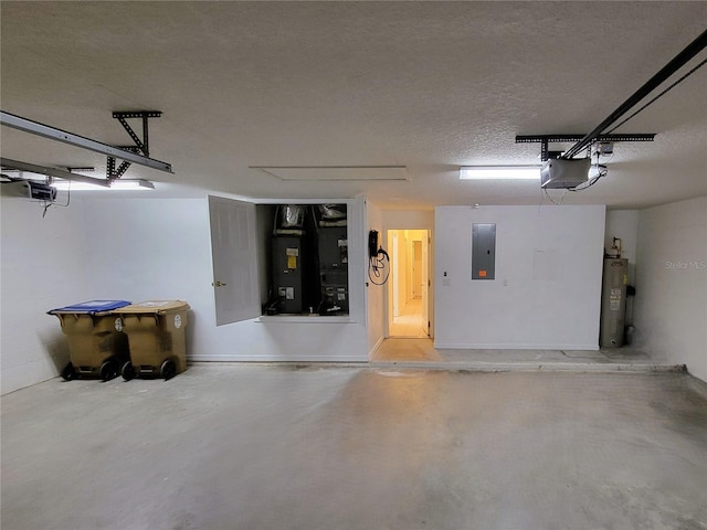 garage featuring a garage door opener, electric panel, and electric water heater